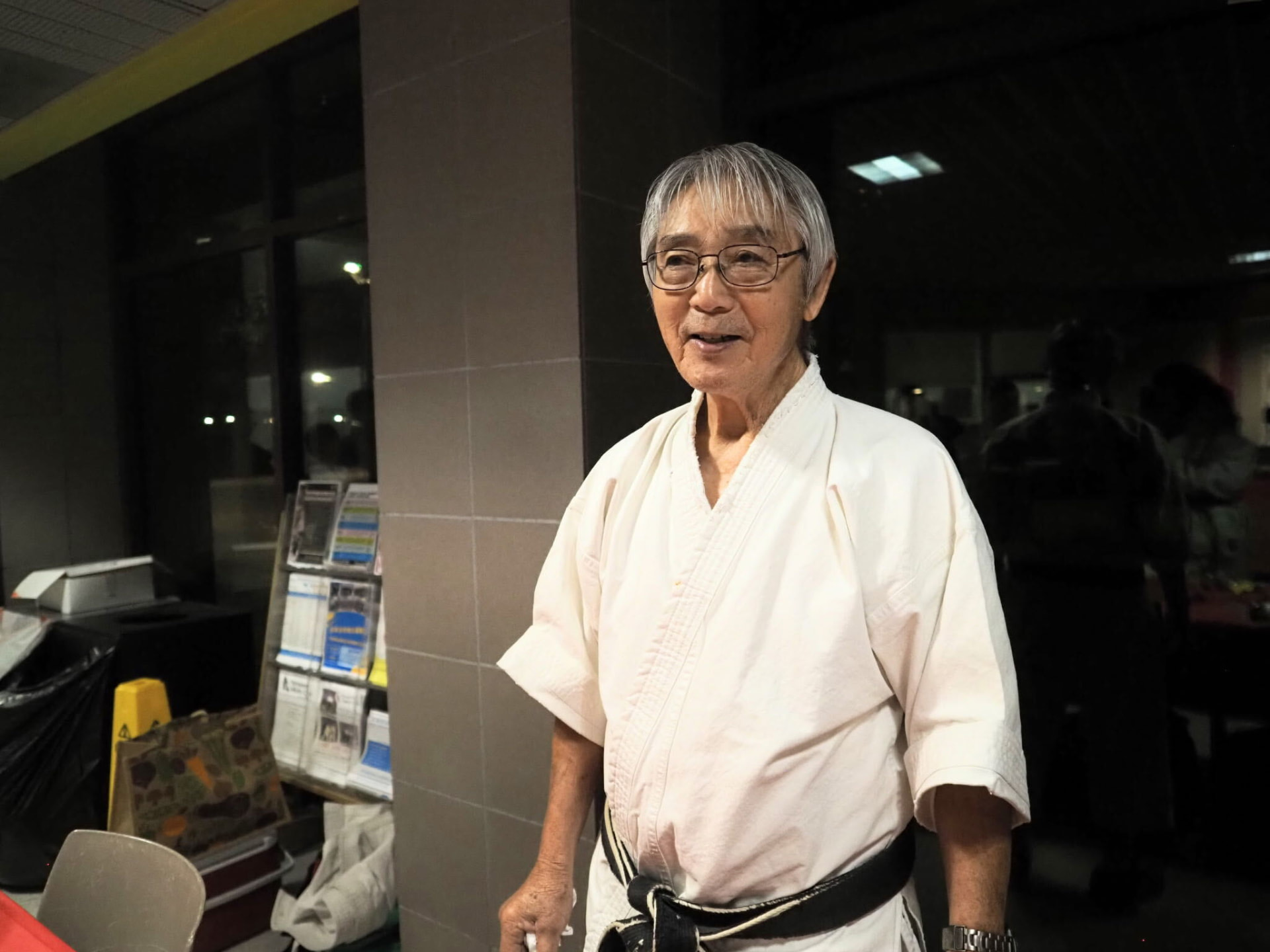 Sensei James Yabe, renowned Shotokan karate instructor, in his white gi and black belt